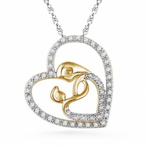 0.20 CT. T.w. Diamond Motherly Love Heart Pendant in Sterling Silver