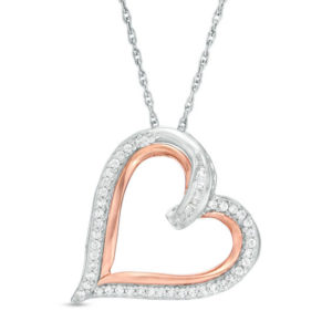 0.23 CT. T.w. Baguette and Round Diamond Tilted Heart Pendant in