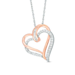0.23 CT. T.w. Baguette and Round Diamond Tilted Double Heart Pendant