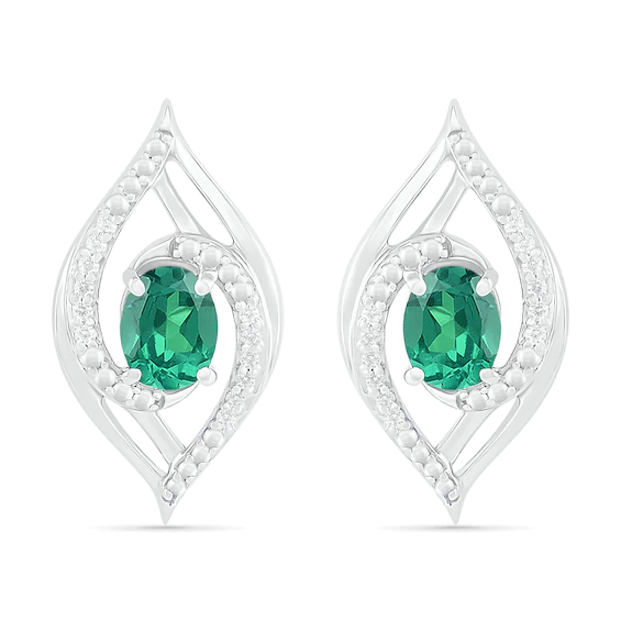 Lab-Created Oval Emerald and 0.067 CT. T.w. Diamond Bypass Flame Stud